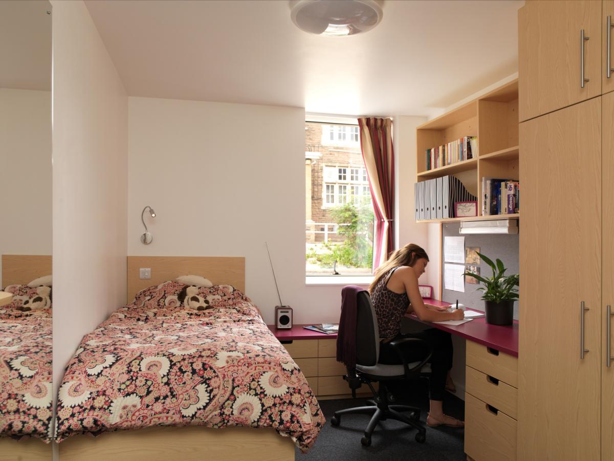 Interior image of a boarding house dorm room.